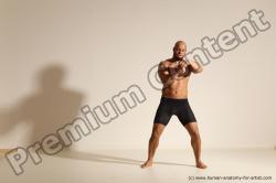 Underwear Gymnastic poses Man Black Muscular Bald Dancing Dynamic poses Academic